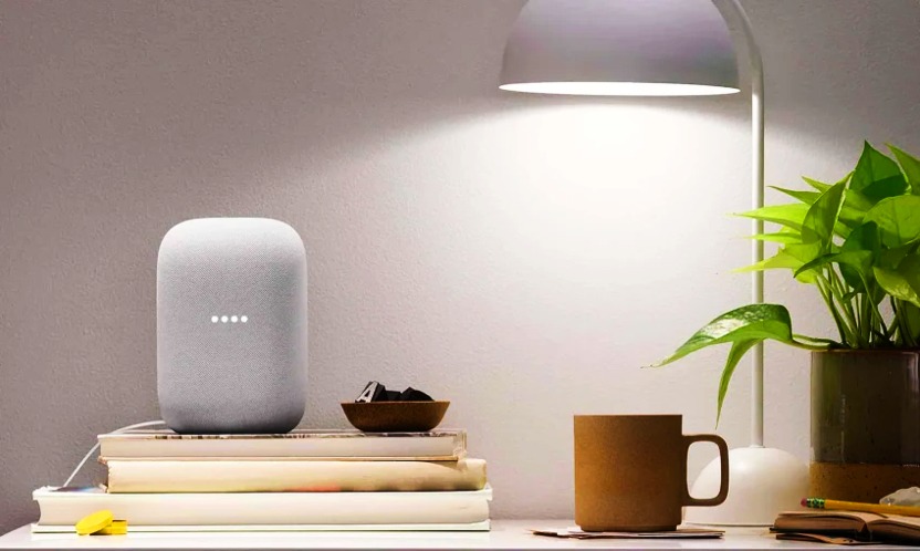 there are best and low cost google home prducts on table there are a lamb also a tea cup 
