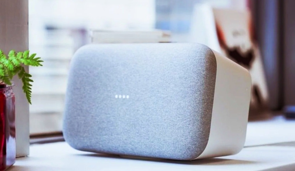 Google Home Max device in grey color are laying on table 