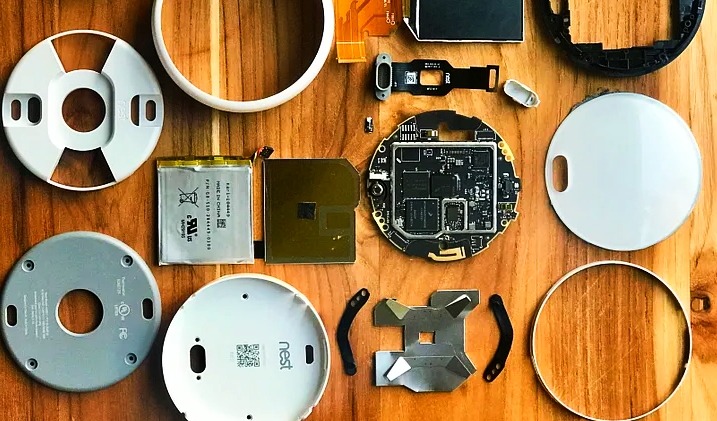 there are parts of Nest Thermostat E on table 